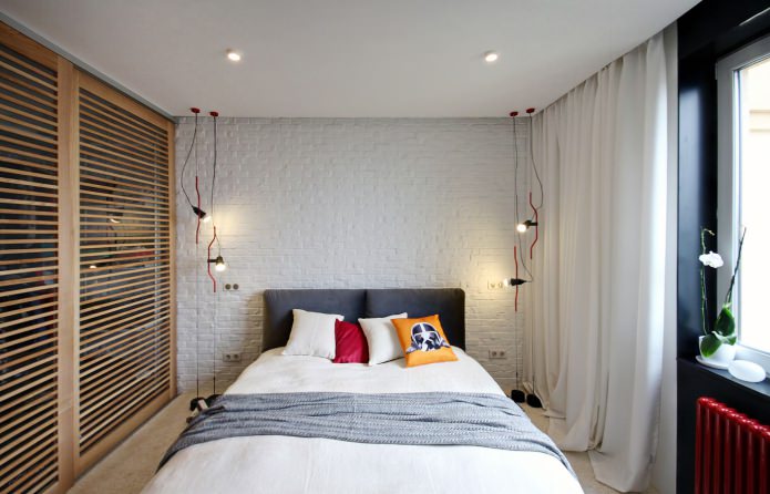white brick wall in the bedroom