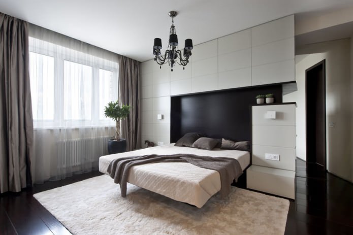 chandelier in the bedroom with stretch ceilings