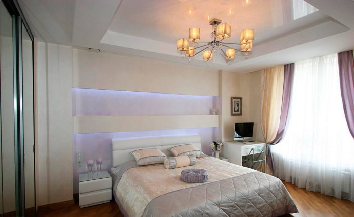 white two-level stretch ceiling in the bedroom interior