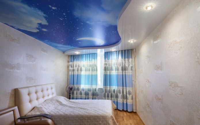 stretch ceiling with photo printing in the bedroom interior
