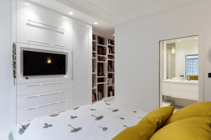 TV in a niche in the bedroom interior