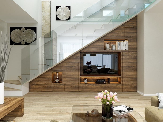 TV in a niche under the stairs in the interior