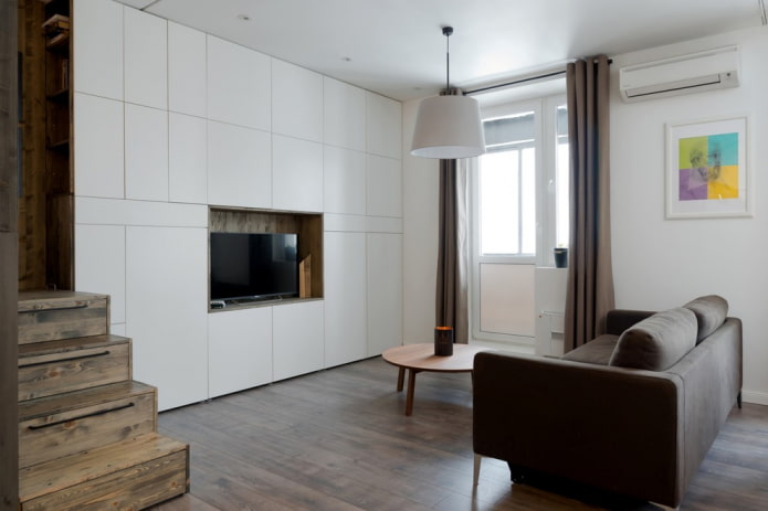 TV in a niche in the living room interior