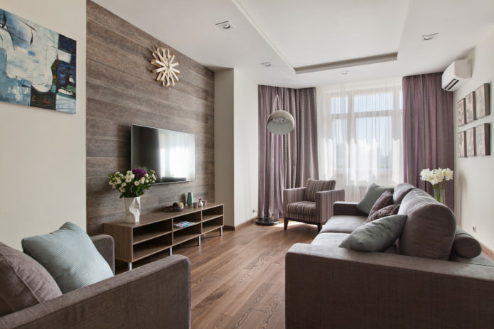 TV in a niche made of laminate in the interior