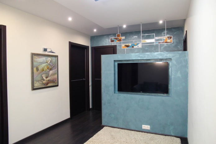 TV in a niche in a partition in the interior