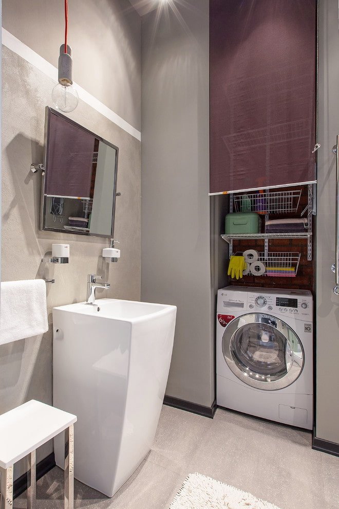 niche with a washing machine in the bathroom interior
