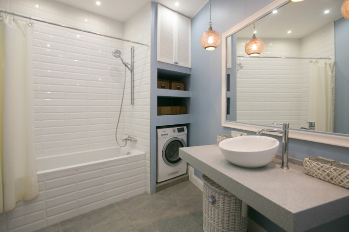 niche with a washing machine in the bathroom interior