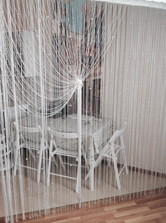 thread curtains in the kitchen interior