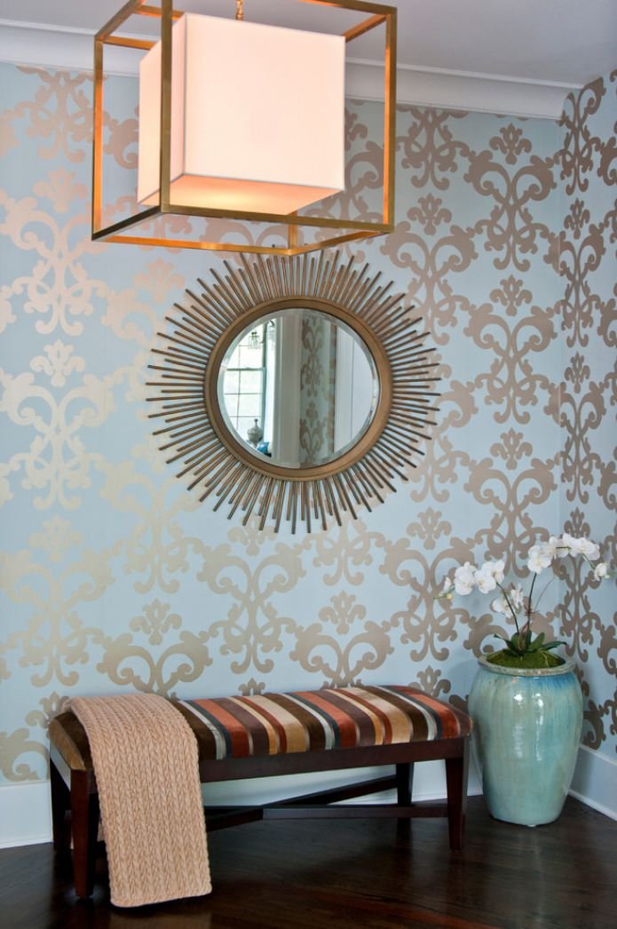 blue wallpaper with a silver pattern