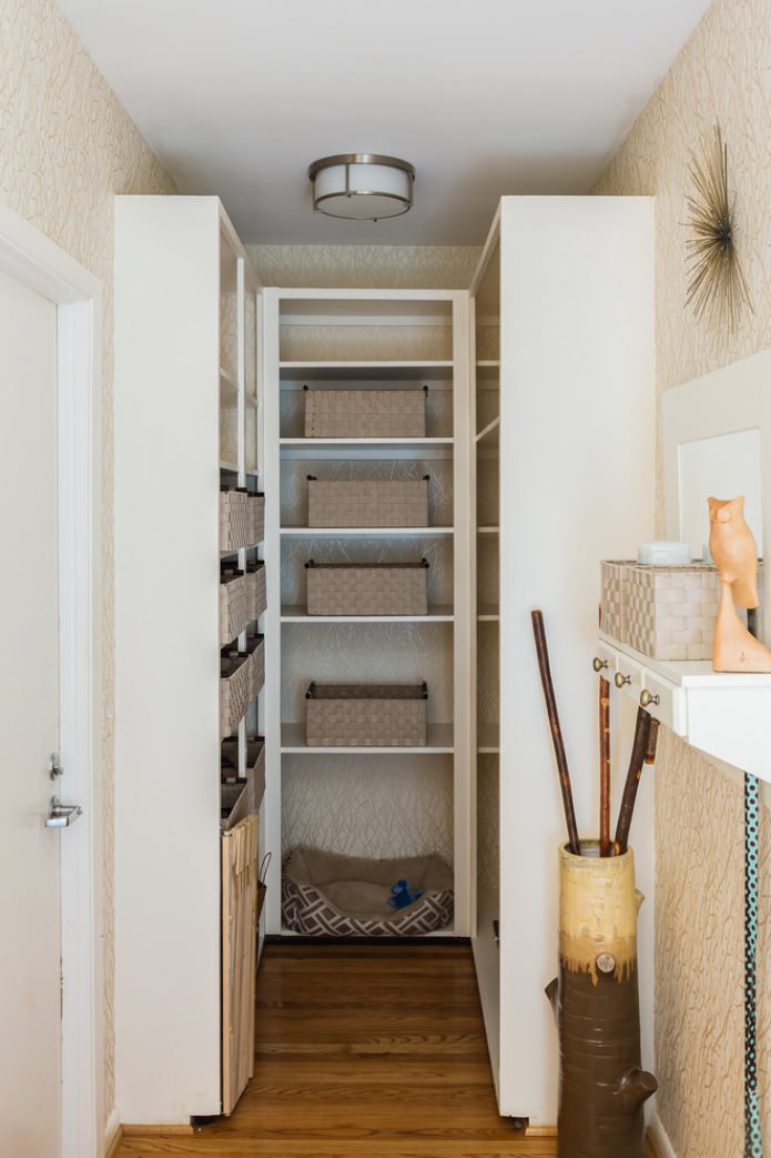 beige wallpaper in a small hallway