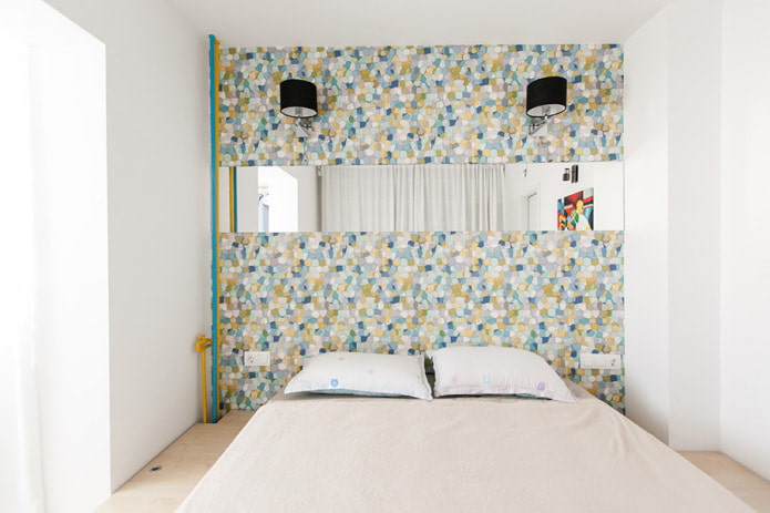 bedroom with an accent wall that imitates mosaic