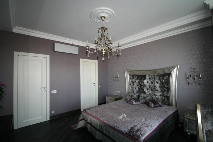 the walls in the bedroom are finished in one color scheme