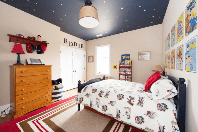 blue wallpaper on the ceiling in the nursery