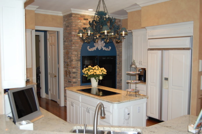 The walls are finished with wallpaper imitating plaster combined with brickwork