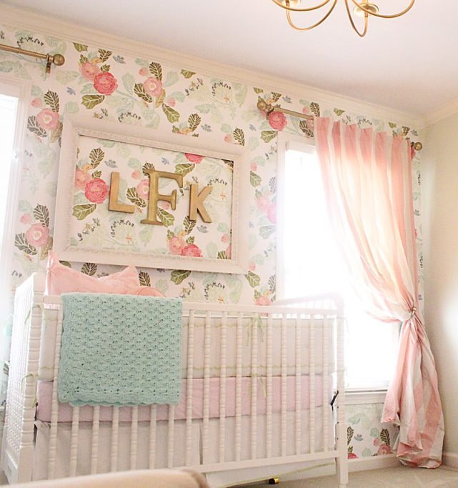 wallpaper with a floral pattern in a girl's bedroom