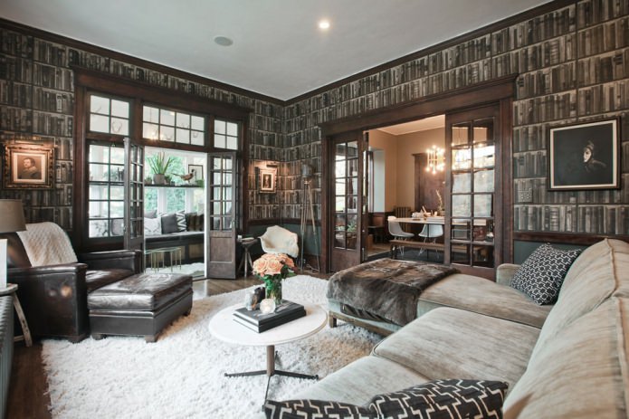 Gray photo wallpaper with books in the living room interior
