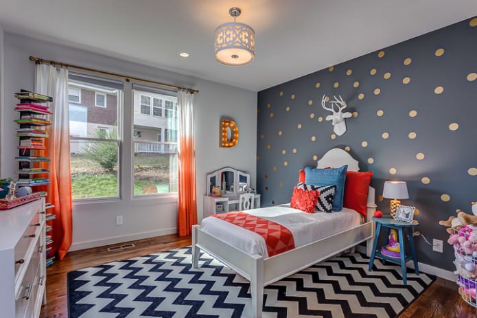 Gray polka dot wallpaper in the nursery