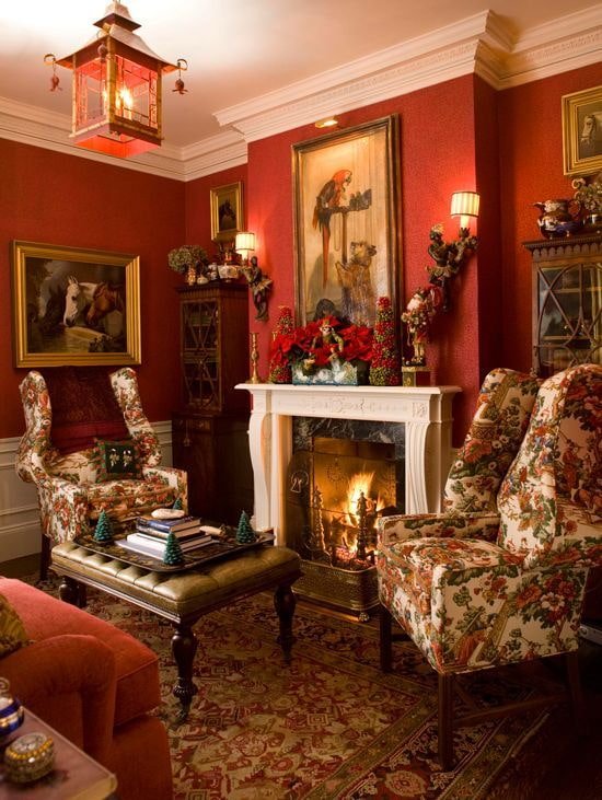 Living room with a fireplace and rich wallpaper