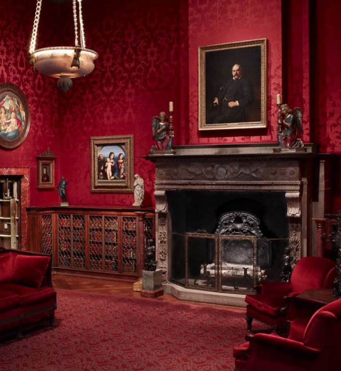 The photo shows a living room with bright wallpaper.