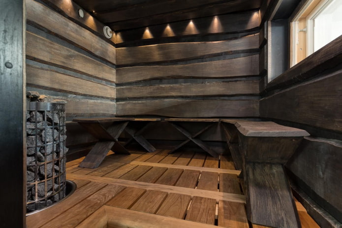 burnt unedged board in the interior of the sauna