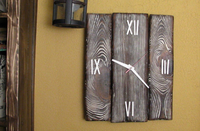 wall clock made of burnt wood