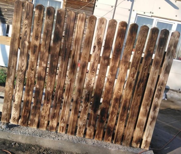 fence made of burnt board