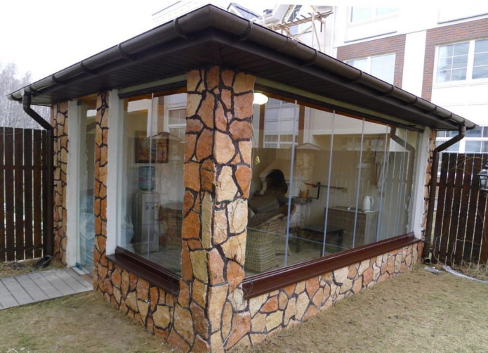 finishing the walls of a gazebo with artificial stone