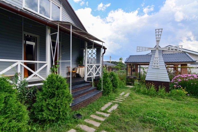 Front garden with a mill
