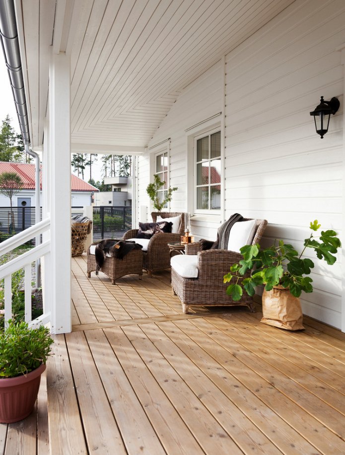 Veranda with wicker chairs