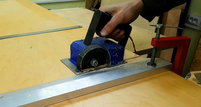 sawing off the plywood