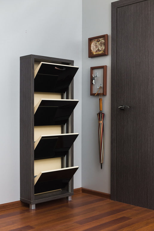 wenge shoe rack in the hallway interior