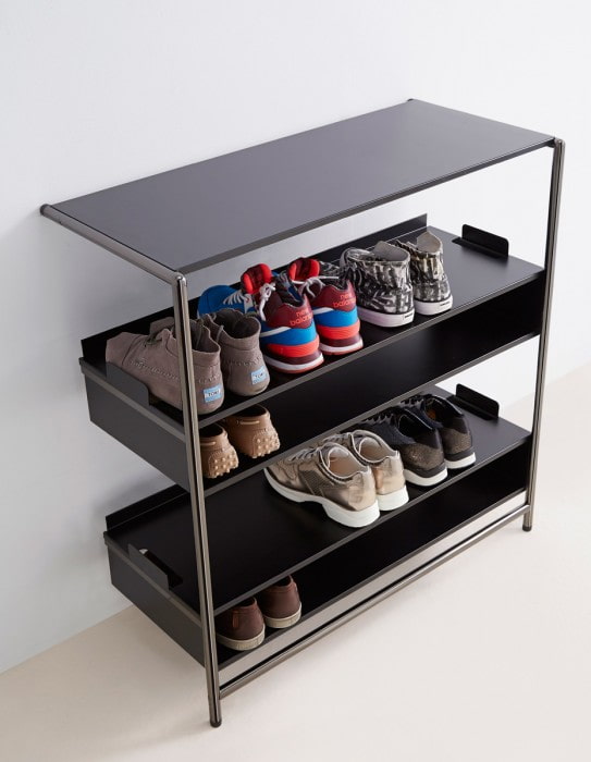 black shoe rack in the interior hallway