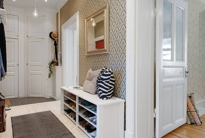 chipboard shoe rack in the interior of the hallway