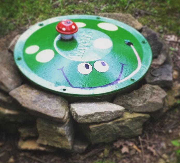painted septic tank lid