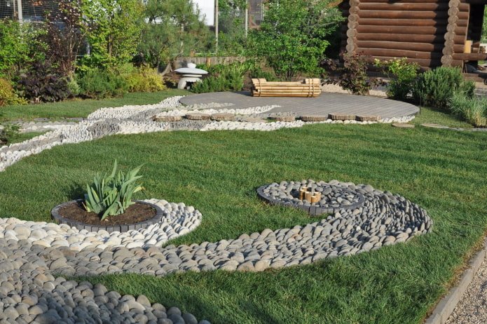 camouflaging a septic tank with a dry stream