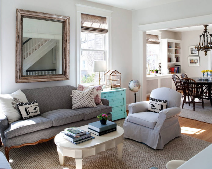 large mirror above the sofa