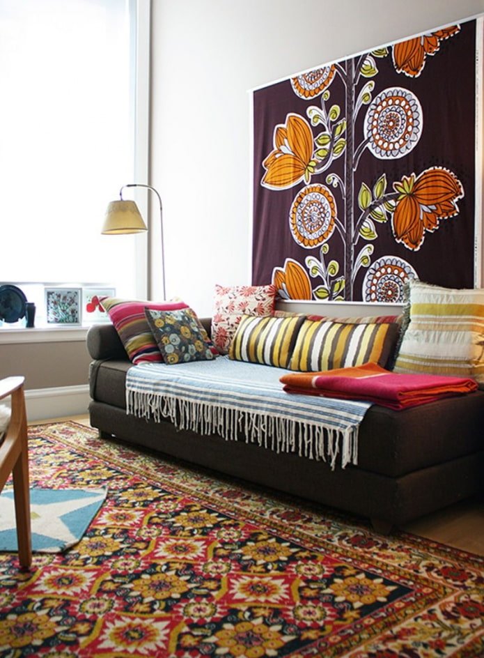 modern tapestry above the sofa