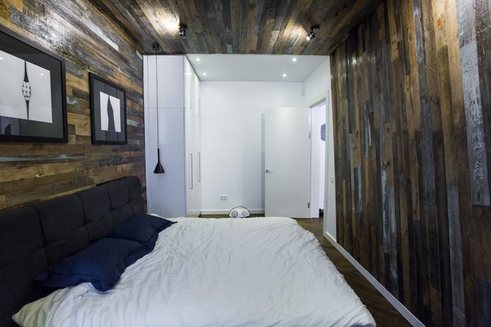 Laminate on the wall and ceiling in the bedroom