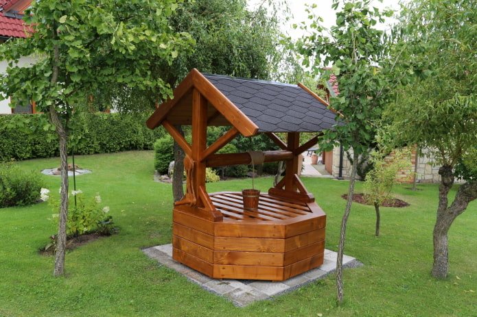 wooden well with a roof