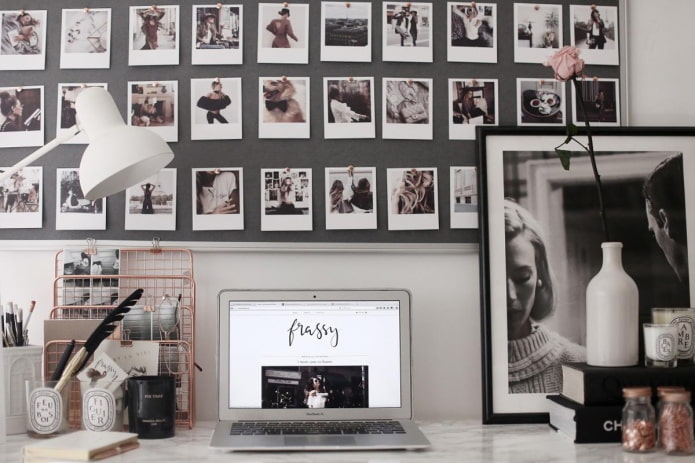 Polaroid pictures on wall in the interior