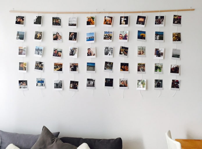 Polaroid photos on the wall in the interior