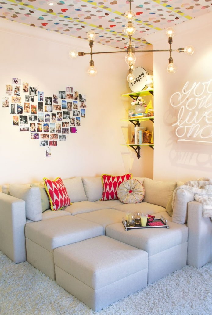 photos in the form of a heart on the wall in the interior