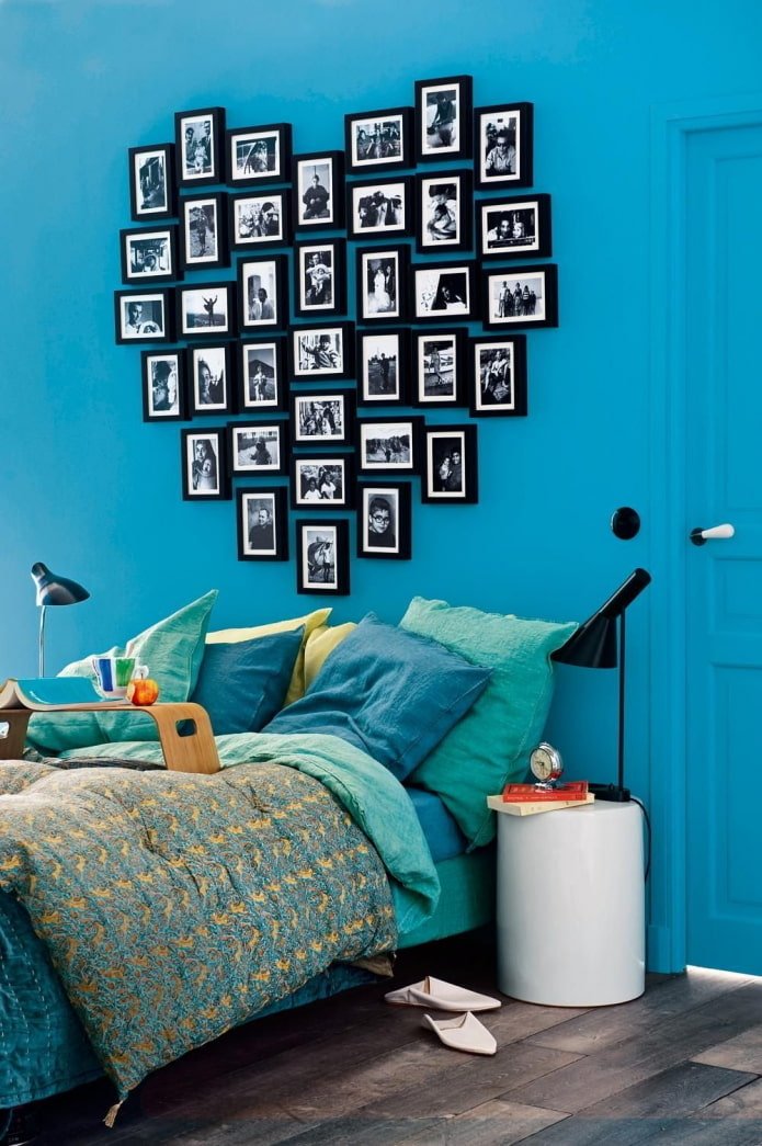 photos in the form of a heart on the wall in the interior