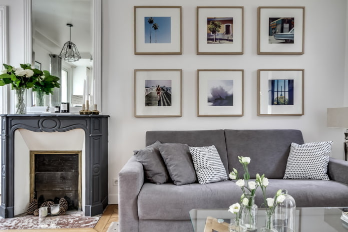 photos above the sofa in the interior