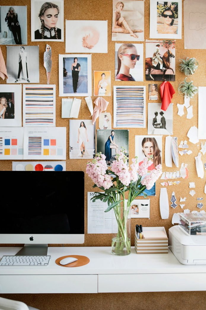 photos on a cork board in the interior