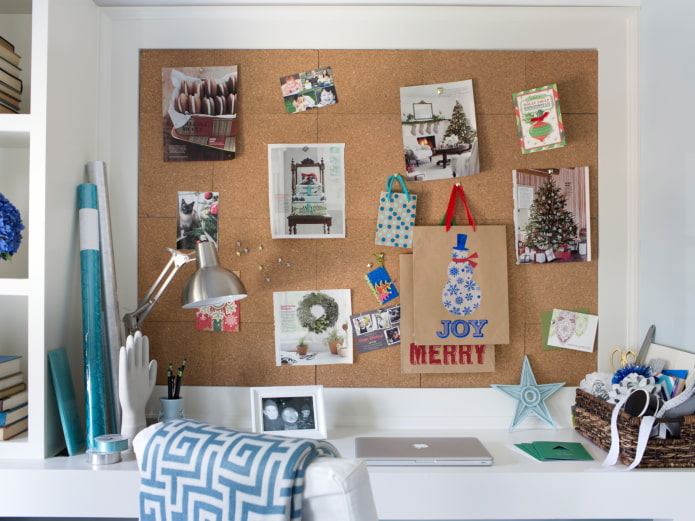 photos on a cork board in the interior