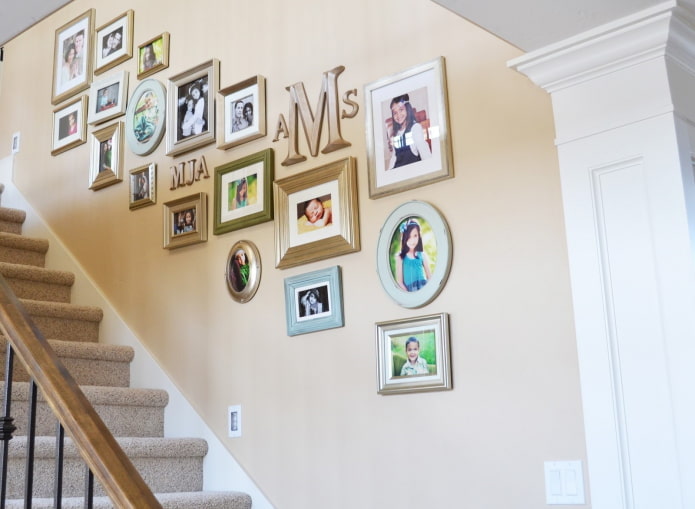 photos along the stairs in the interior