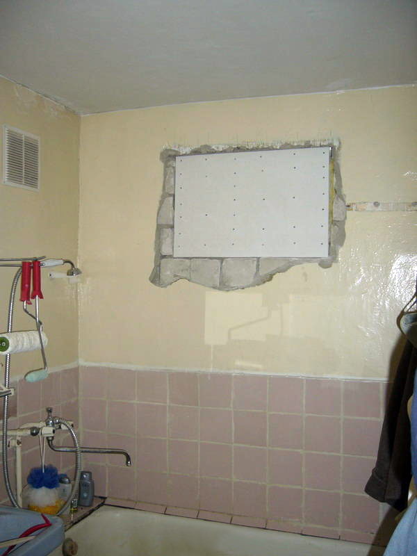 Window covered with plasterboard