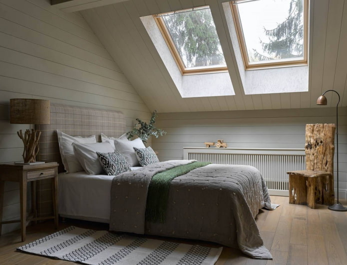 white plaster on the slopes of the attic bedroom