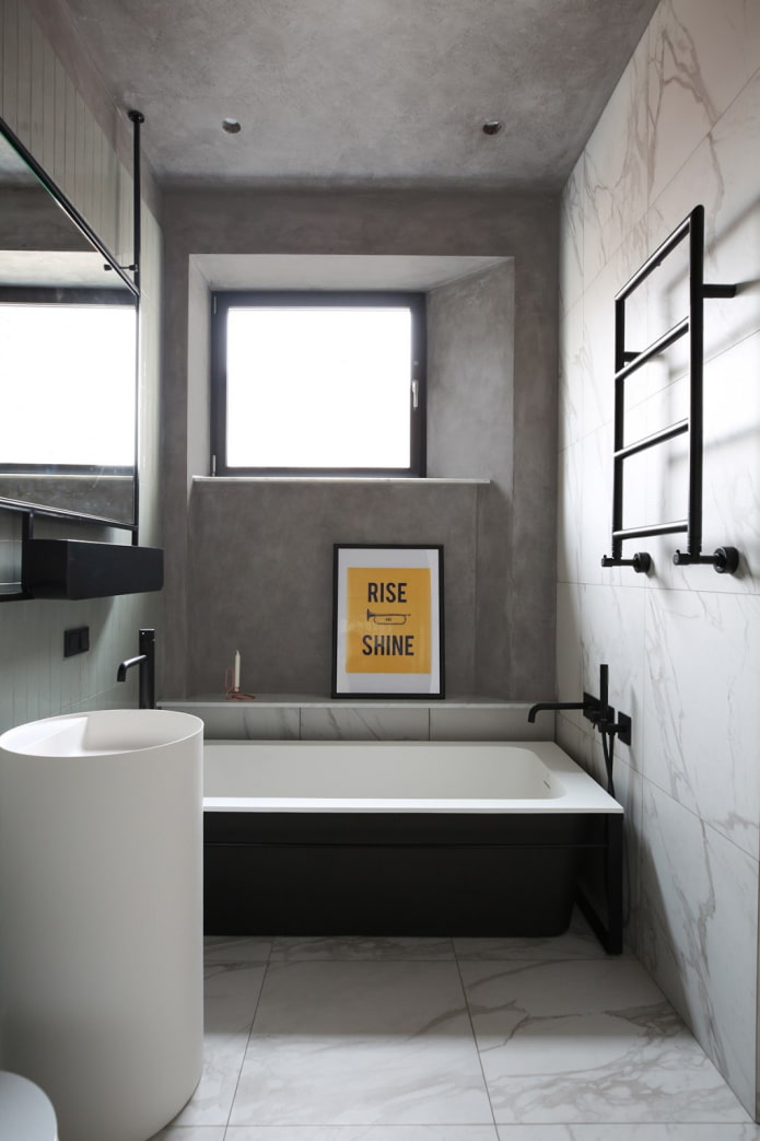 gray plaster on the slopes and ceiling of the bathroom
